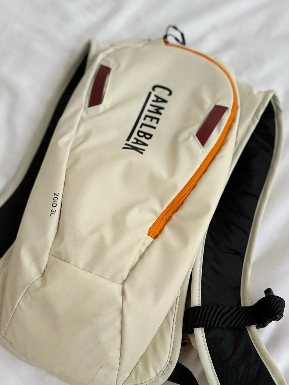 CamelBak Cream Hydration Backpack with Orange Detail